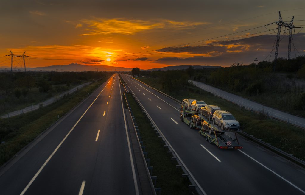auto transport at sunset
