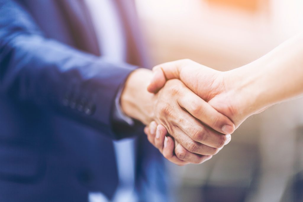 Concept,Of,Negotiating,Business,And,Handshake,Gesturing,People,Connection,Deal.