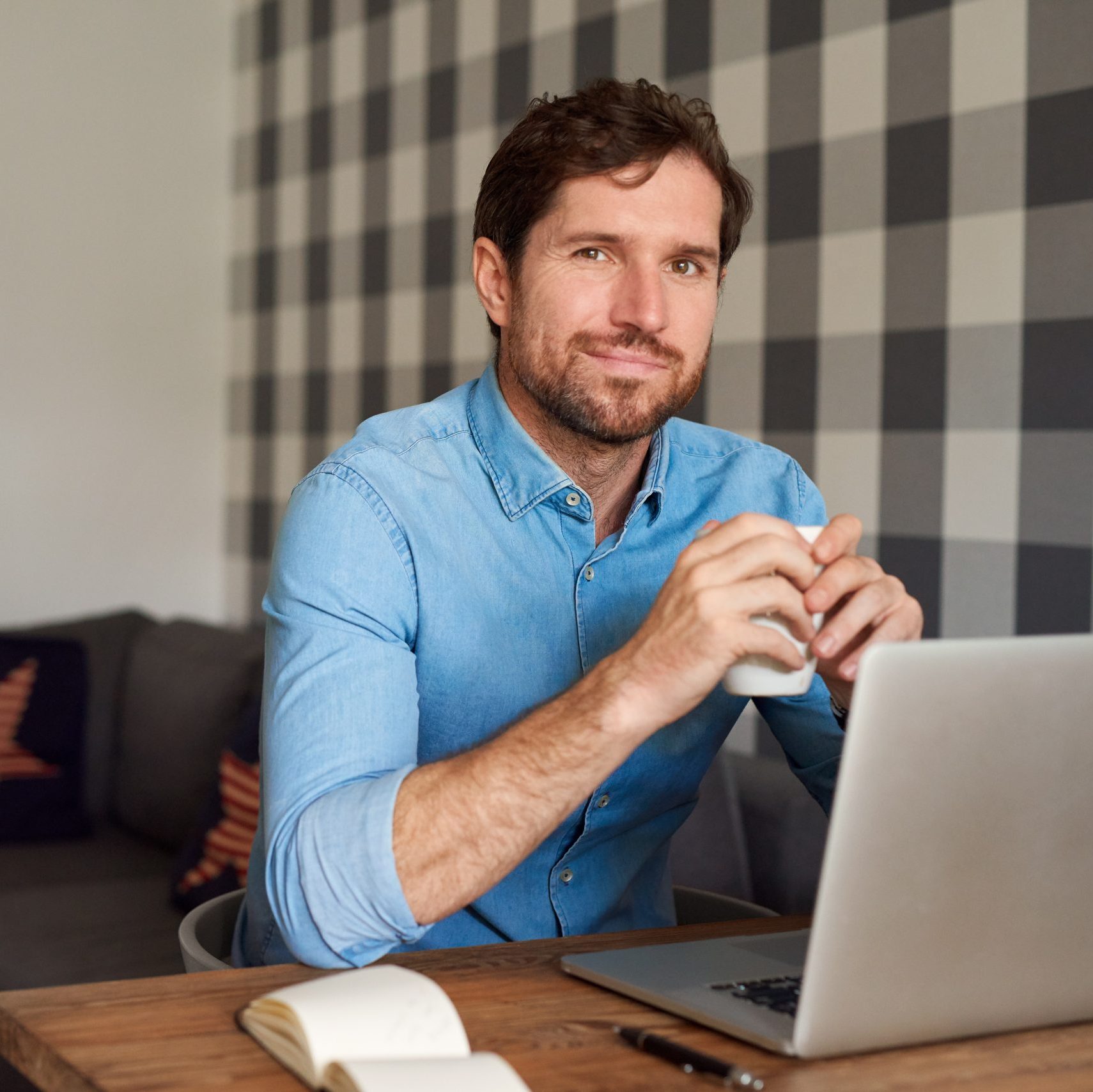 Person researching car shipping on a laptop